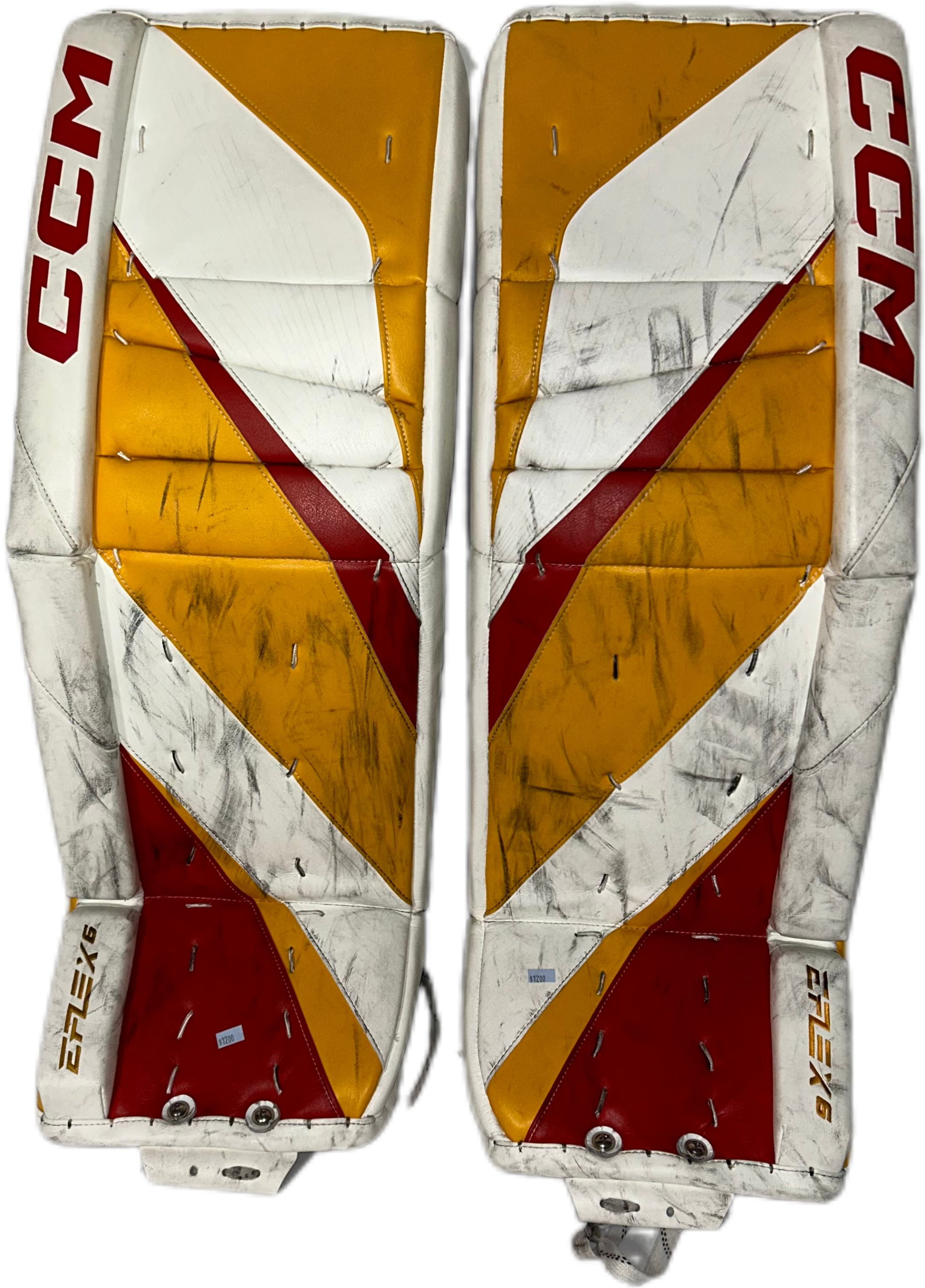 CCM Extreme Flex 6 - Used NHL Pro Stock Goalie Pads - Dustin Wolf (White/Yellow/Red)